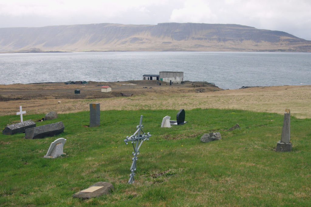 An old cemetery by a beautiful fjord in Iceland.