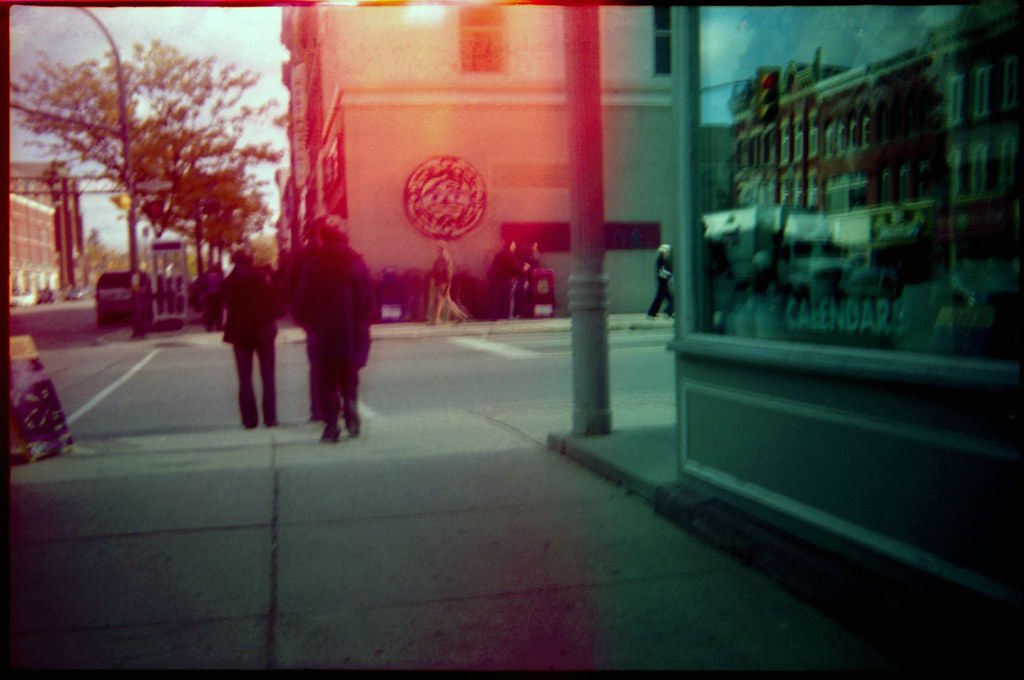A street photo with light leaks.