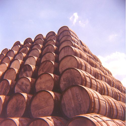 A pyramid of wooden barrels.