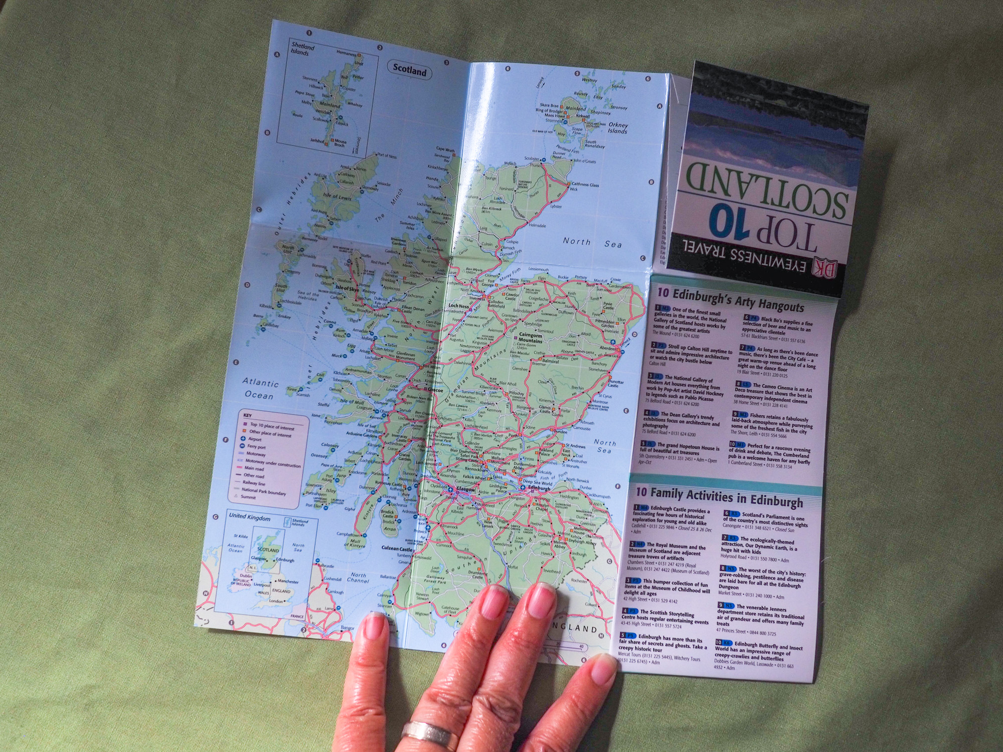 A small, paper map of Scotland, unfolded.